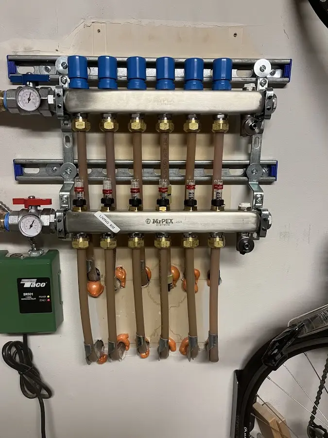 Plumber performing Sink Repair at a residential property in McPherson